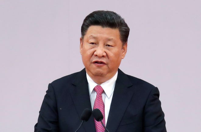 In this Saturday, July 1, 2017, file photo, Chinese President Xi Jinping speaks after administering the oath for the Hong Kong's new Chief Executive Carrie Lam at the Hong Kong Convention and Exhibition Center in Hong Kong. The White House said Sunday that President Donald Trump has spoken with the leaders of China and Japan and reaffirmed their shared commitments to dealing with North Korea.