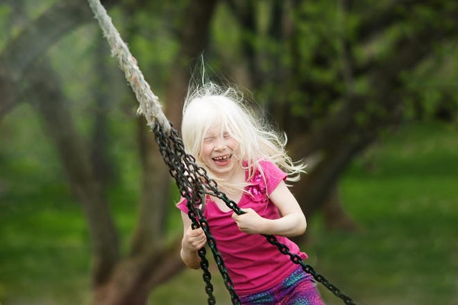 Ellie Leden, 7, suffers from poor vision because she was born with oculocutaneous albinism. [PHOTO PROVIDED]