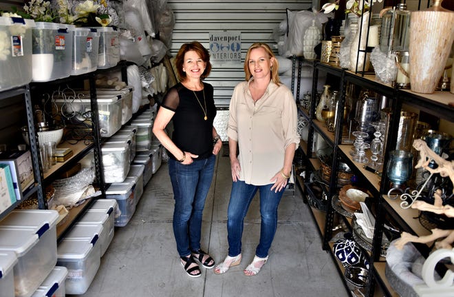 Debbie Hutchison (left) and Lori Savard, owners of Davenport Interiors, in a one of their storage units in Plumstead on Friday, June 2, 2017. They have several units filled with home accessories they use to decorate homes for sale.