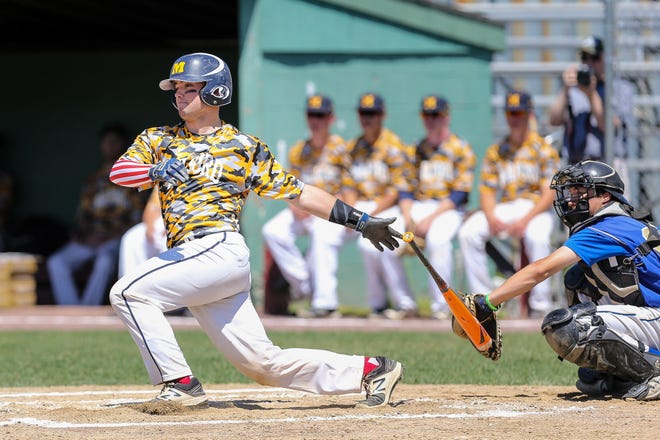 Milford Post 59's Alex Reynolds strokes a single to drive in the run during Post 59's 11-7 win over Framingham Post 74 in American Legion baseball action at Fino Field in Milford on Tuesday. [Daily News and Wicked Local Photo/Dan Holmes]