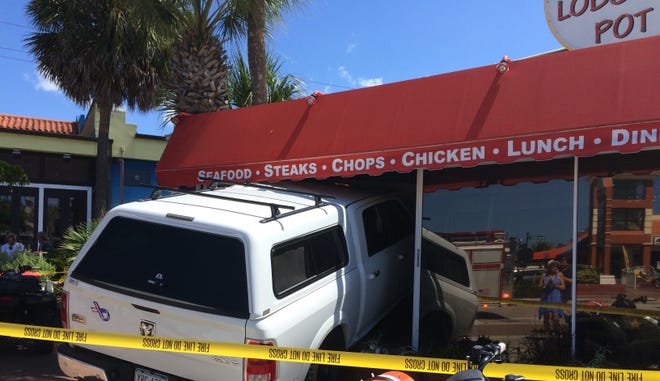 A Dodge Ram vehicle crashed into the Lobster Pot restaurant on Siesta Key on Tuesday. No one was injured in the restaurant; the driver was taken to Sarasota Memorial Hospital. [COURTESY OF FLORIDA HIGHWAY PATROL]