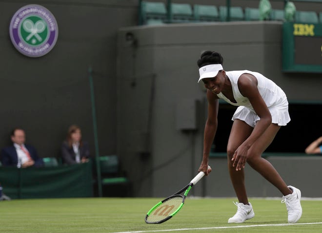 Venus Williams of the United States smiles during her Women’s Singles Match against Belgium’s Elise Mertens on the opening day at the Wimbledon Tennis Championships in London Monday, July 3, 2017. (AP Photo/Tim Ireland)