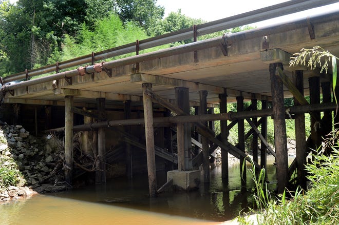 The bridge on Crescent Avenue that crosses Fairforest Creek is slated to be replaced using funds from the new gas tax increase, which began taking effect Saturday. [JOHN BYRUM/Spartanburg Herald-Journal]