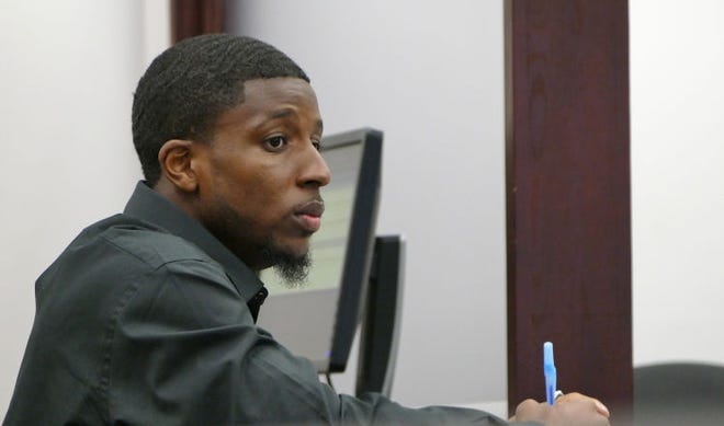 Randolph Graham listens to arguments by his lawyer during a court hearing in earlier this year. Graham is accused of second-degree murder in the stabbing death of USF football player Elkino Watson, who was involved in a fight outside an Ybor City club in 2015. Graham's attorneys have filed a motion to dismiss the charges, citing Florida's "stand your ground" self-defense law. [JAMES BORCHUCK/TAMPA BAY TIMES]