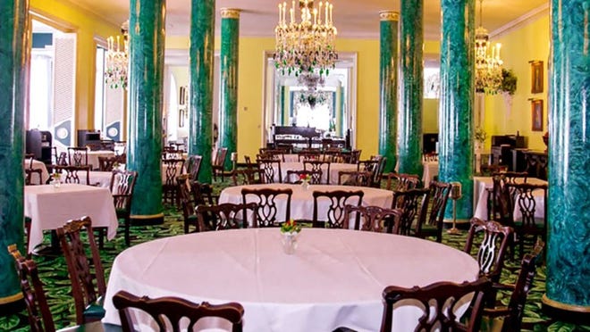 The design team at Dorothy Draper & Co. had the columns in the Main Dining Room at The Greenbrier resort faux-painted to resemble malachite. Photo courtesy The Greenbrier
