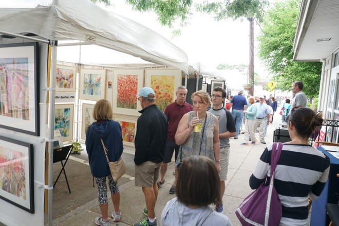 Approximately 200 artists will show their handiwork on Saturday and Sunday at the Wickford Arts Festival in Wickford Village. [The Providence Journal, file / Sandor Bodo]