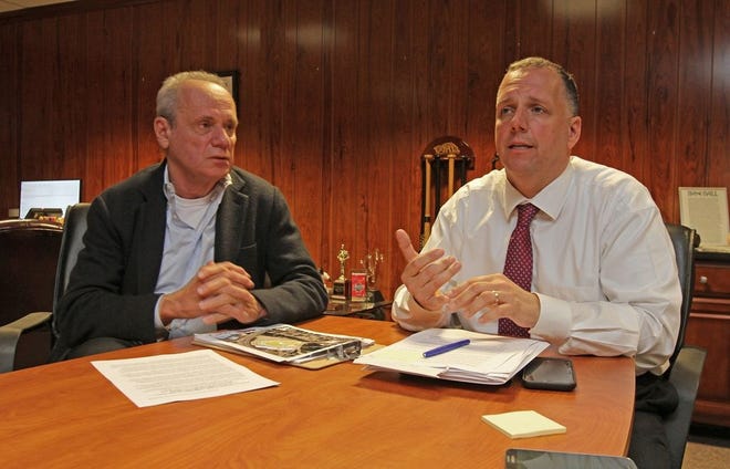 Pawtucket Red Sox Chairman Larry Lucchino, left, and Pawtucket Mayor Donald Grebien, pictured here in May, have been working together to get a new stadium built.  [The Providence Journal / Steve Szydlowski]