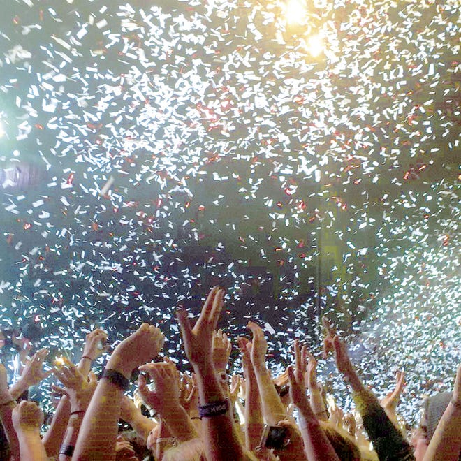 Confetti fills the sky during an All Time Low concert Lauren attended at the Mann Center's Skyline Stage in 2015. "Music does an exceptional job of providing relief and security when we need it the most," she writes.