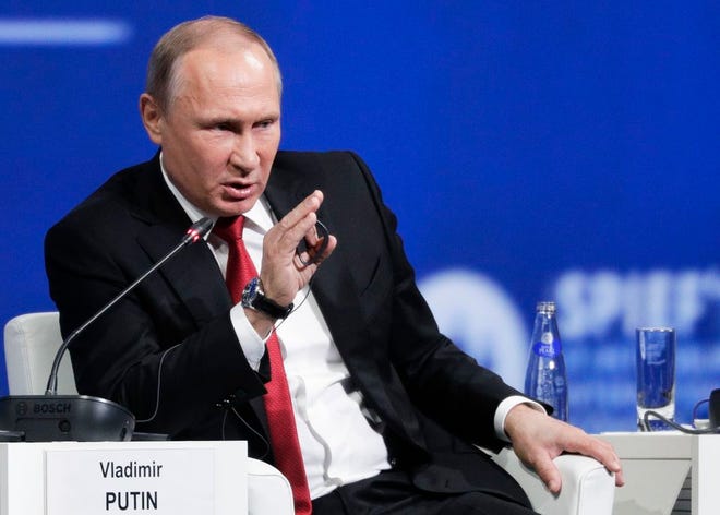 Russian President Vladimir Putin speaks in St.Petersburg, Russia, in June.
