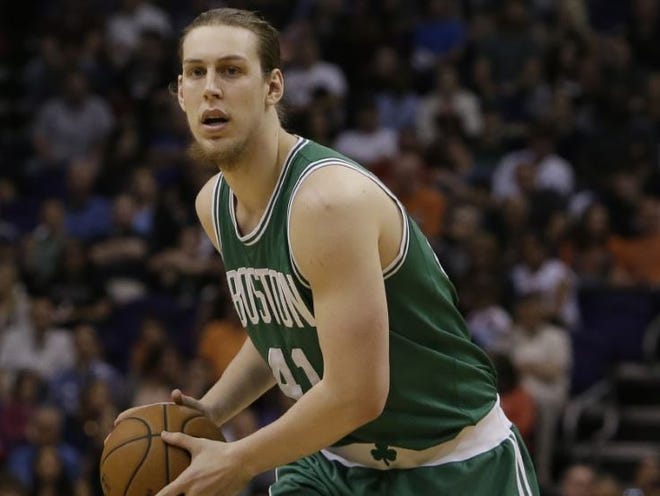 Kelly Olynyk, who averaged nine points and 4.8 rebounds with the Celtics last season, signed a four-year deal with Miami on Thursday night.