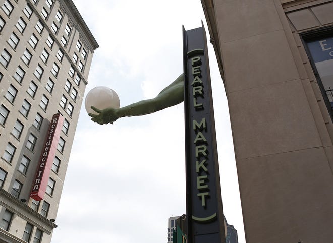 A new sign for the Pearl Market is part of the improvements to Lynn and Pearl alleys. [Jonathan Quilter/Dispatch]