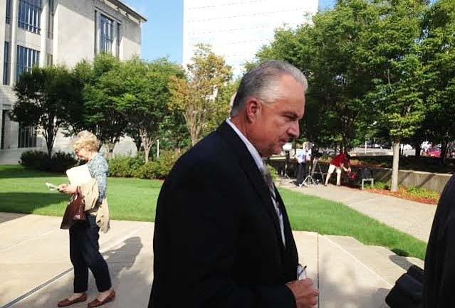 Arkansas Treasurer Dennis Milligan leaves the federal courthouse in Little Rock on Aug. 8, 2016. [ARKANSAS NEWS BUREAU FILE PHOTO]