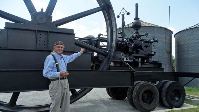 Clyde Clardy donates a 160-year-old steam engine to Lost Pines Art Center, the first “sculpture” in its planned sculpture garden. MARY HUBER/BASTROP ADVERTISER