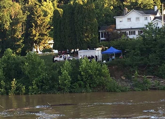 One kayaker remained missing in the Hocking River early Sunday after being swept over the White's Mill waterfall in Athens County on Saturday.