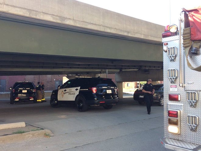 A male was transported to a local hospital with injuries believed to be life-threatening after he attempted to jump across the northbound/southbound Kansas Ave. bridges on Sunday evening. He fell about 25 feet, landing at S.W. 2nd and Kansas Ave. (Katie Moore/The Capital-Journal)