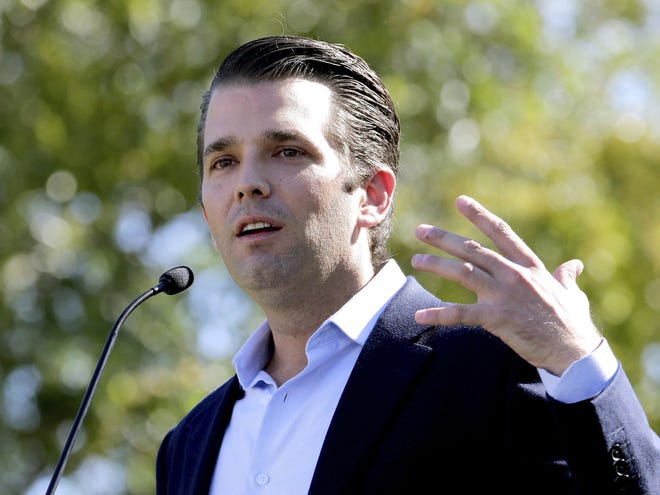 FILE - In this Friday, Nov. 4, 2016 file photo, Donald Trump Jr. campaigns for his father Republican presidential candidate Donald Trump in Gilbert, Ariz. Donald Trump’s eldest son, son-in-law and then-campaign chairman met with a Russian lawyer shortly after Trump won the Republican nomination, in what appears to be the earliest known private meeting between key aides to the president and a Russian. Representatives of Donald Trump Jr. and Jared Kushner confirmed the June 2016 meeting to The Associated Press after The New York Times reported Saturday, July 8, 2017 on the gathering of the men and Russian lawyer Natalia Veselnitskaya at Trump Tower. (AP Photo/Matt York, File)