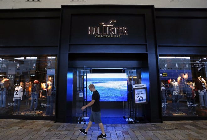Consumers have responded favorably to store remodeling at Abercrombie & Fitch brand Hollister, helping the surf-themed business post the first quarterly rise in comparable-store sales in a year. [Brennan Linsley/The Associated Press]