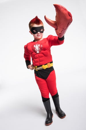Jackson Hall, 5, poses in his Lobsterman superhero costume for a movie he is making through the Make-A-Wish Foundation. [Cameron Triggs/Special to The Gazette]