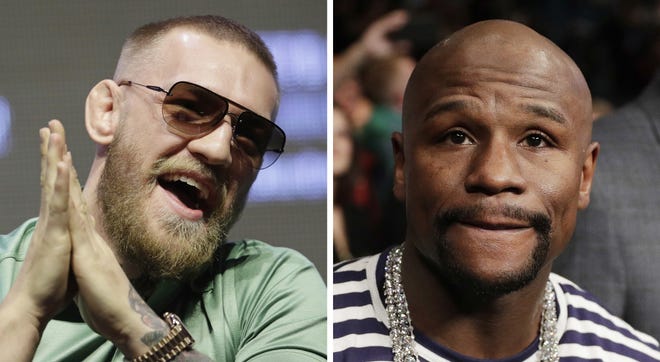 Conor McGregor, left, speaks during a UFC 202 MMA press conference in Las Vegas in 2016. At right, in a Jan. 28 photo, boxer Floyd Mayweather Jr. attends a fight in Las Vegas. Mayweather and McGregor will fight on August 26 in a boxing match. [AP Photo/John Locher]