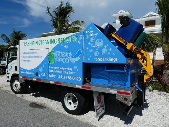 The Bins Be Clean truck uses hot water, high-pressure jets and 360-degree, spinning spray heads to clean recycling and garbage bins. [COURTESY PHOTO]