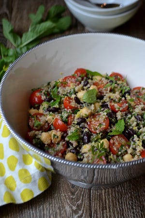 Balela Salad with quinoa, tomatoes, black beans, garbanzo beans, fresh herbs and a lemon vinaigrette