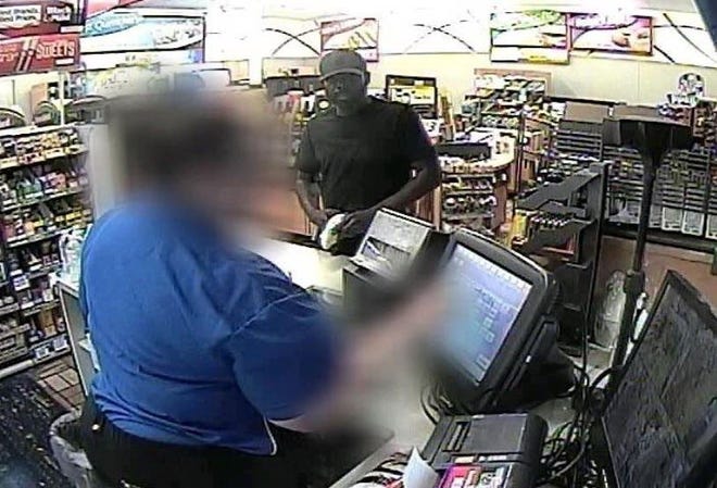Columbus police say this man robbed a Speedway on the Far East Side early Monday with a handgun wrapped in a white sock.