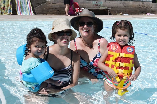 Cindy Barajas, back, with her daughter Camay Megerdoomian and granddaughters Mila, age 3, and 1-year old Nicole, represent three generations that have enjoyed swimming in the Dunsmuir Community Pool. While at the pool July 6, 2017, Barajas praised the efforts of those who keep the pool going and the pool bucks program that "makes it cheaper for the kids." By Liz Pyles
