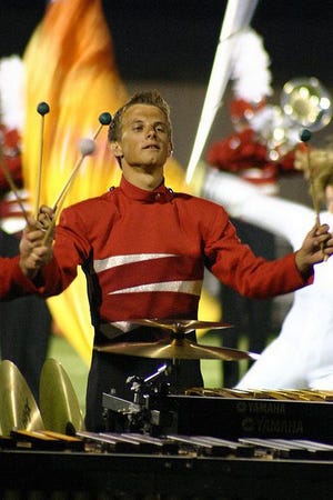 Kyle Barshinger is seen performing with the Colts drum corps out of Dubuque, Iowa, a few years back. The Galesburg High School and Illinois State University alumnus is the new band director at Monmouth-Roseville High School.