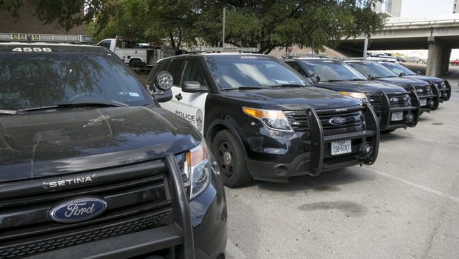 Austin Police Ford utility vehicles are parked on East 8th Street outside APD Headquarters on Tuesday July 11, 2017. JAY JANNER / AMERICAN-STATESMAN