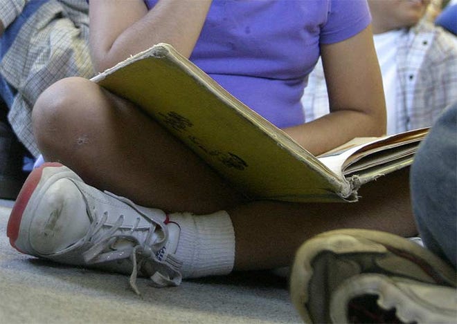 Third-graders must pass either the state's standardized reading test or one of four state-approved alternative tests to be promoted. [Dispatch file photo]