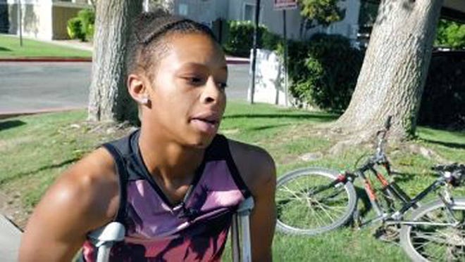 A case of mistaken identity led an altercation in which police punched Tatyana Hargrove in the mouth and more. (Screengrab from NAACP Bakersfield video)