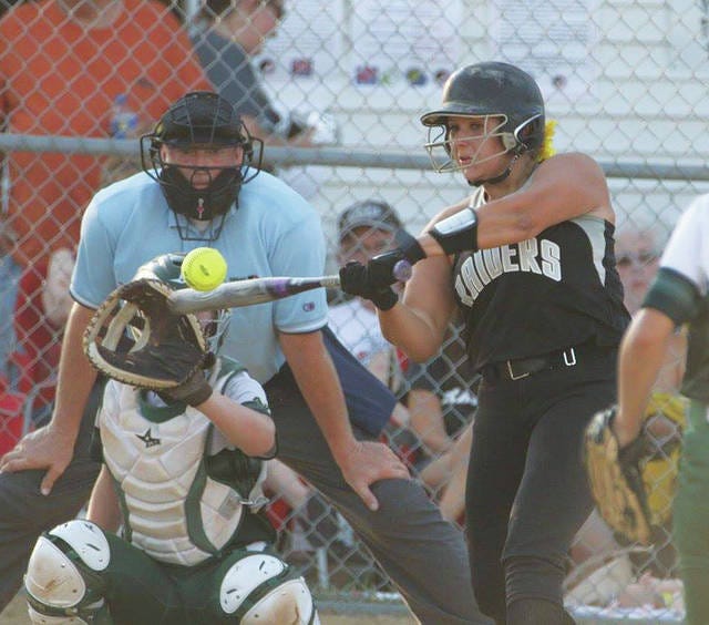 Collins-Maxwell-Baxter’s Abbey Kahler makes contact during an at-bat against Woodward-Granger in the Class 2A regional quarterfinal softball game between the two teams July 5 at Collins. CMB prevailed by a 6-2 score. Photo by Stacie Mallon