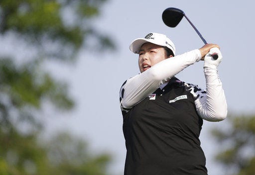 Shanshan Feng tees off on her way to the U.S. Women’s Open lead in Thursday’s first round.