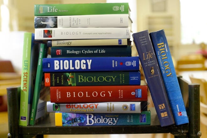 A stack of science textbooks. [Dan Lopez/Tuscaloosa News]