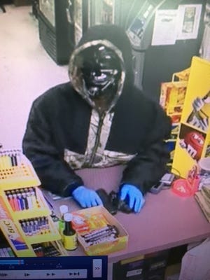 Marion County Sheriff’s Office officials released this picture of a lone gunman who robbed a Belleview convenience store on Friday. [Submitted photo]