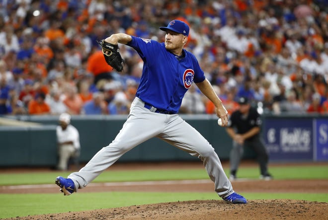 Chicago Cubs starting pitcher Mike Montgomery throws to the Baltimore Orioles in the second inning of an interleague baseball game in Baltimore on Friday, July 14, 2017. [PATRICK SEMANSKY/THE ASSOCIATED PRESS]