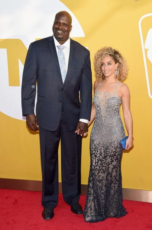Basketball great Shaquille O'Neal keeps girlfriend Laticia Rolle of Gardner on the move, but she always finds way to give back to her hometown. [File Photo]