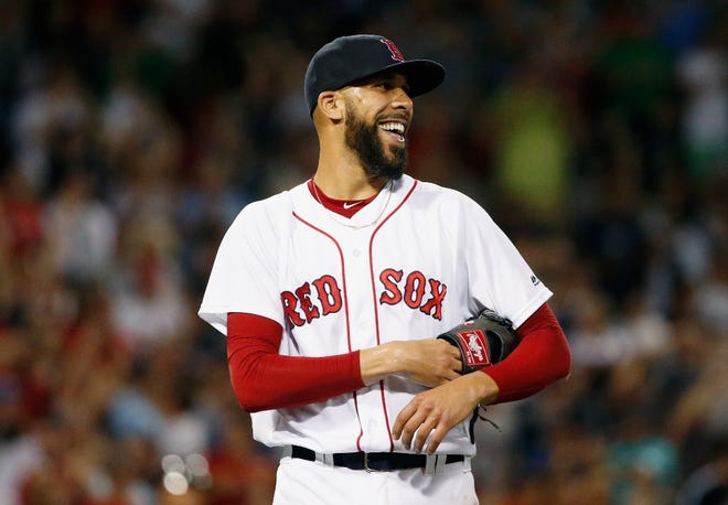 Boston's David Price reacts after a phenomenal catch by Jackie Bradley Jr. on a deep fly ball by New York's Aaron Judge in the eighth inning of the second game of Sunday's doubleheader.