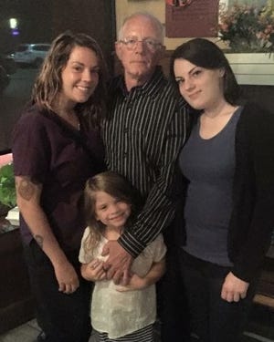 Caitlin Dull (left), her daughter, Parisa Shahamat, her father, Tom Dull, and her sister Emily Anne Dull Anderson posed for a photo about three years ago. Anderson has been missing since June 19, 2017. Caitlin has been helping lead a media effort aimed at finding Anderson. [PHOTO PROVIDED]