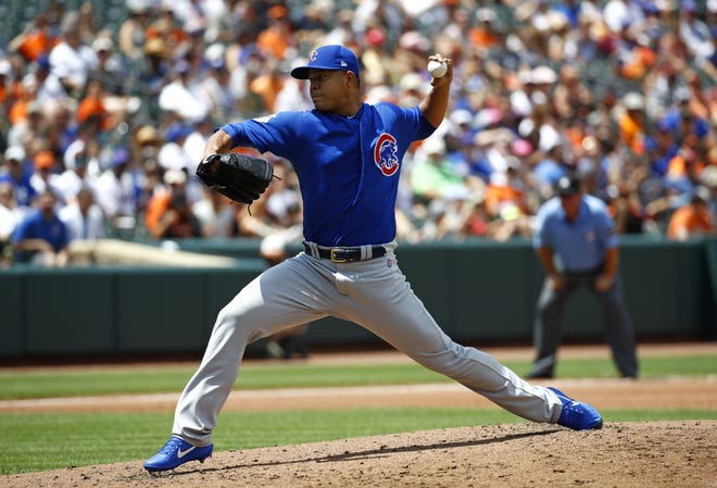 Chicago Cubs starting pitcher Jose Quintana throws to the Baltimore Orioles in the second inning of a baseball game in Baltimore, Sunday, July 16, 2017. [PATRICK SEMANSKY/AP PHOTO]