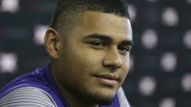 TCU quarterback Kenny Hill speaks to reporters Monday during Big 12 media days. Hill will be working with a new play-caller this fall after Doug Meacham departed to join the coaching staff at Kansas. CREDIT: AP Photo/LM Otero