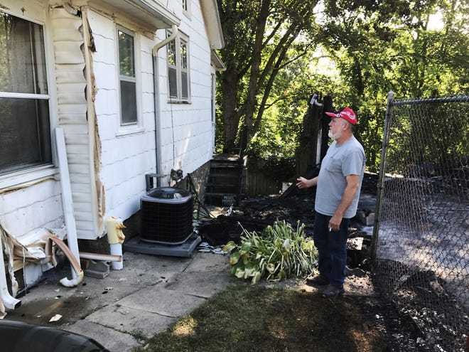 Jeff Hunt recalls the fire which disrupted his nap Monday July 17, 2017 at his home at 320 N. Plane St. in Burlington. The fire, which began Sunday afternoon, destroyed a garage at 216 N. Plane St. and the flames melted siding on his house and parts of his car.Burlington and West Burlington firefighters responded and the fire is under investigation.