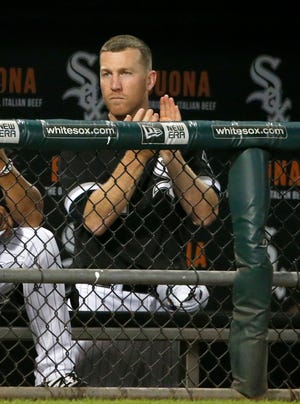 Chicago White Sox third baseman Todd Frazier applauds his team during the ninth inning against the Los Angeles Dodgers in a baseball game Tuesday, July 18, 2017, in Chicago. The Dodgers won 1-0. (AP Photo/Charles Rex Arbogast)