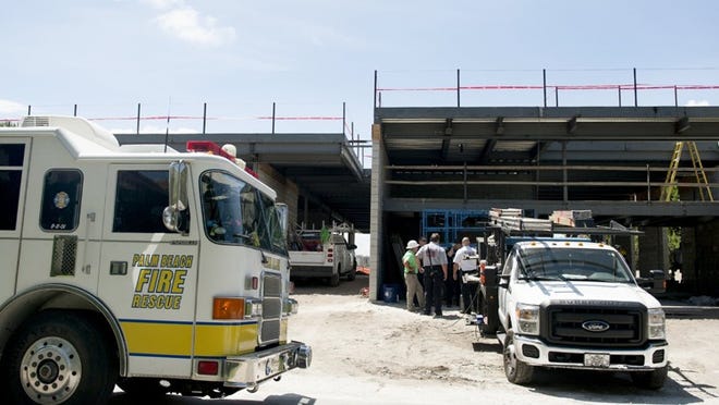 Palm Beach Police and Fire Rescue respond to a construction site earlier this year. (Meghan McCarthy / Daily News)