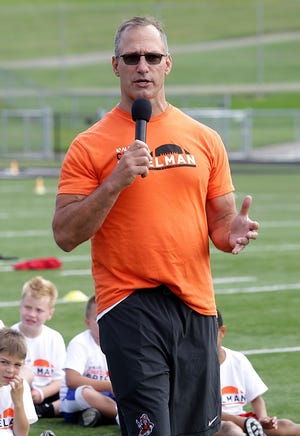 Chris Spielman talks to kids at the Aultcare Chris Spielman Football Pro Camp held at Paul Brown Tiger Stadium.

 (IndeOnline.com / Kevin Whitlock)