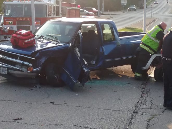 NICK VLAHOS/JOURNAL STAR

A blue pick-up truck was damaged Wednesday morning in a collision at War Memorial Drive and Knoxville Avenue in Peoria.