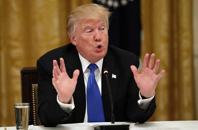 "Any senator who votes against starting debate is really telling America that you're fine with Obamacare," Trump said on Wednesday. (AP Photo/Alex Brandon)