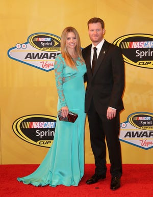 LAS VEGAS, NV - DECEMBER 05: Dale Earnhardt Jr. and his girlfriend Amy Reimann arrive on the red carpet prior to the 2014 NASCAR Sprint Cup Series Awards at Wynn Las Vegas on December 5, 2014 in Las Vegas, Nevada. (Photo by Chris Graythen/NASCAR via Getty Images)
