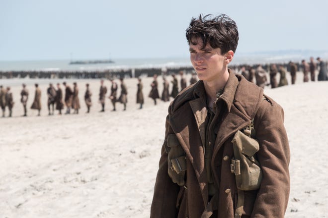 Fionn Whitehead in a scene from "Dunkirk." [Melinda Sue Gordon/Warner Bros. Pictures]