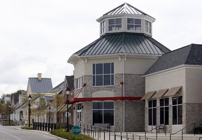 The Shoppes at River Ridge in Dublin, seen in 2010, included vacant storefronts at that time. Observers say Americans' buying habits changed over the past several decades and retailers must change with them. [Dispatch file photo]